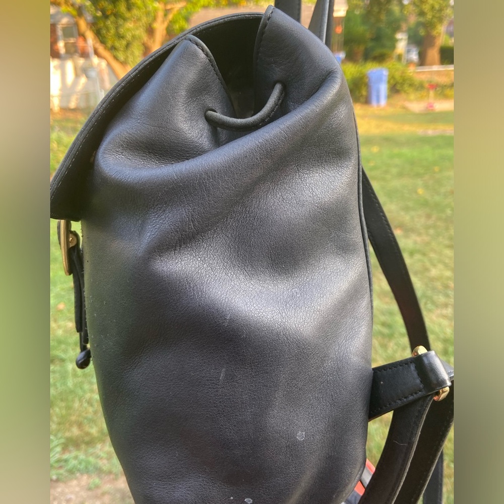 leather Coach backpack 11” x 11”.  VIEW PICS CLOSELY, SCRATCHES ON FRONT FLAP - Picture 3 of 9